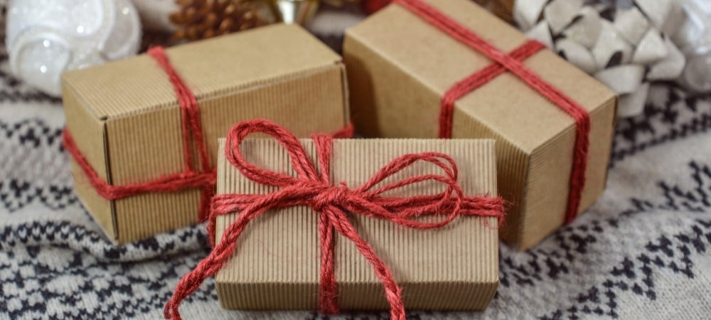 Homemade Christmas gifts wrapped in brown paper